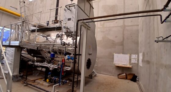 Local chaufferie chaudière vers cheminée